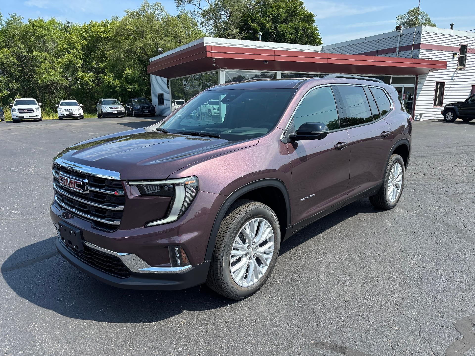 2026 GMC Acadia Elevation in Crystal Metallic — front three-quarter view