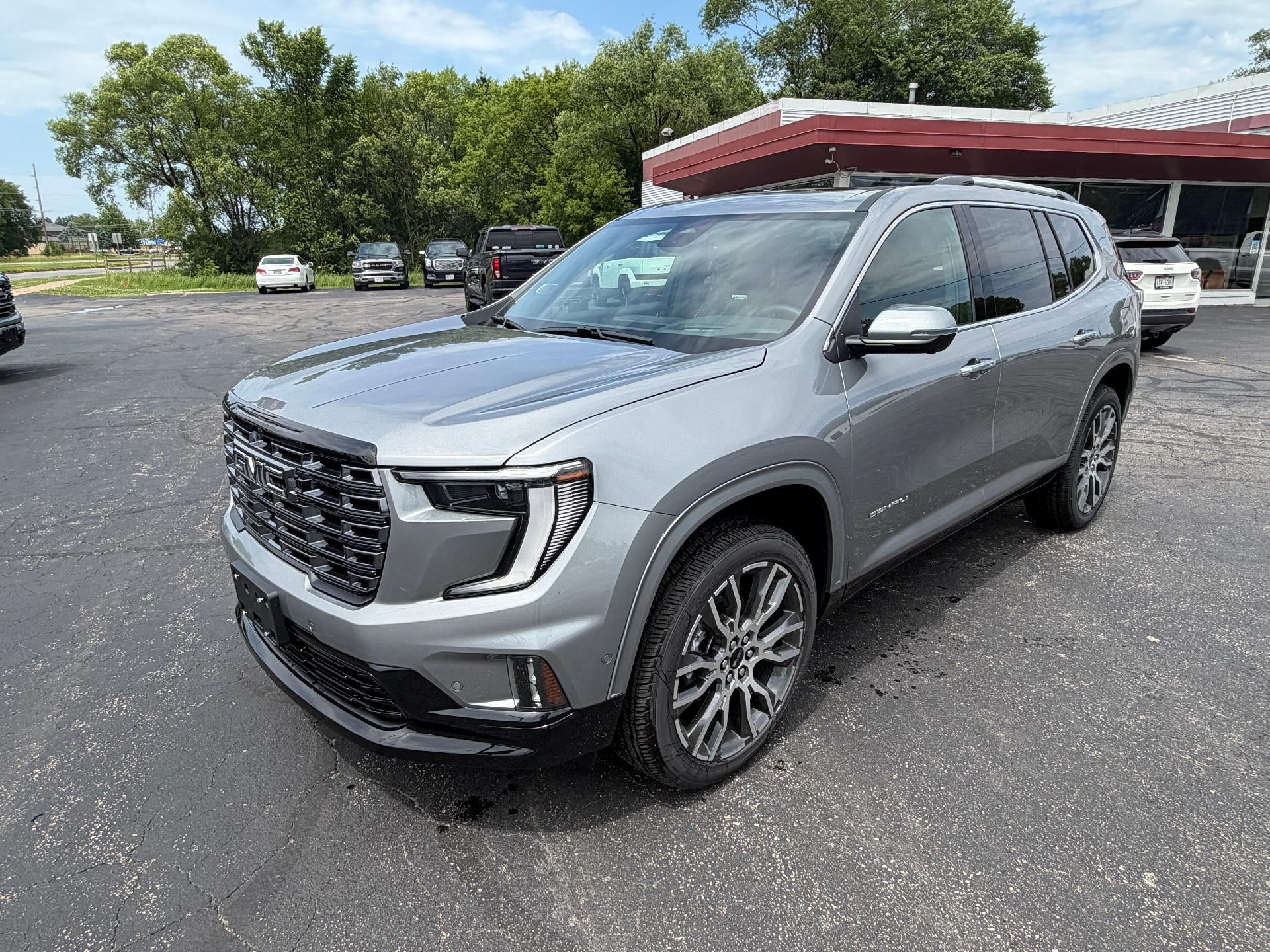 2026 GMC Acadia Denali Ultimate in Sterling Metallic — front three-quarter view