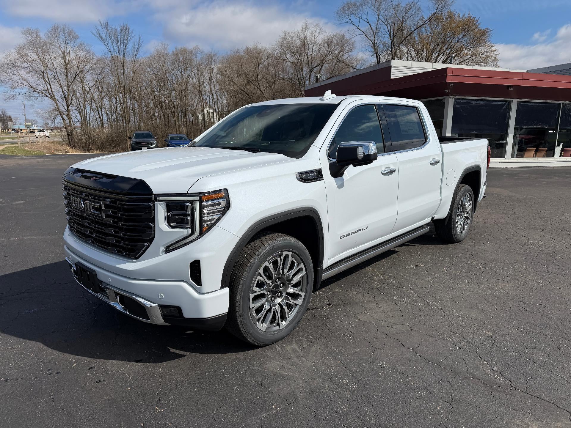 2026 GMC Sierra 1500 Denali Ultimate in Glacier White Tricoat — front three-quarter view